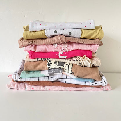 Stack of baby clothing